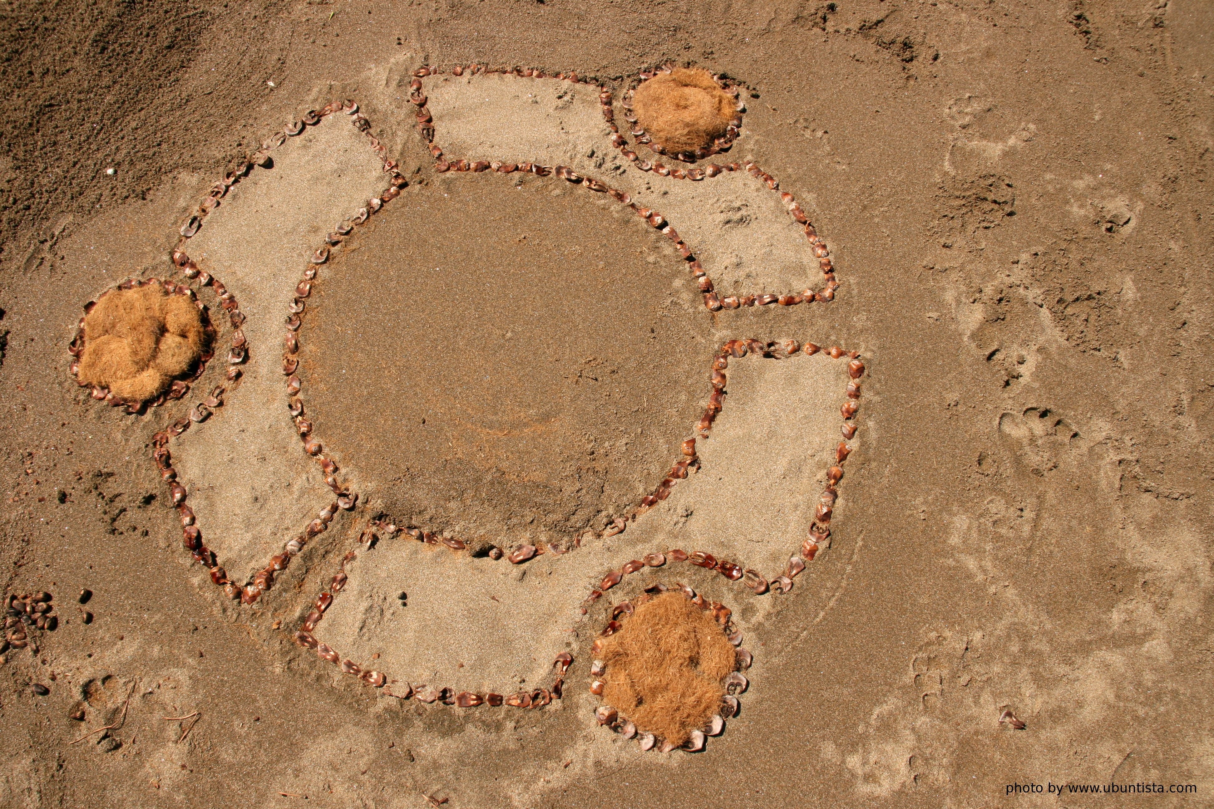 sand art design on beach
