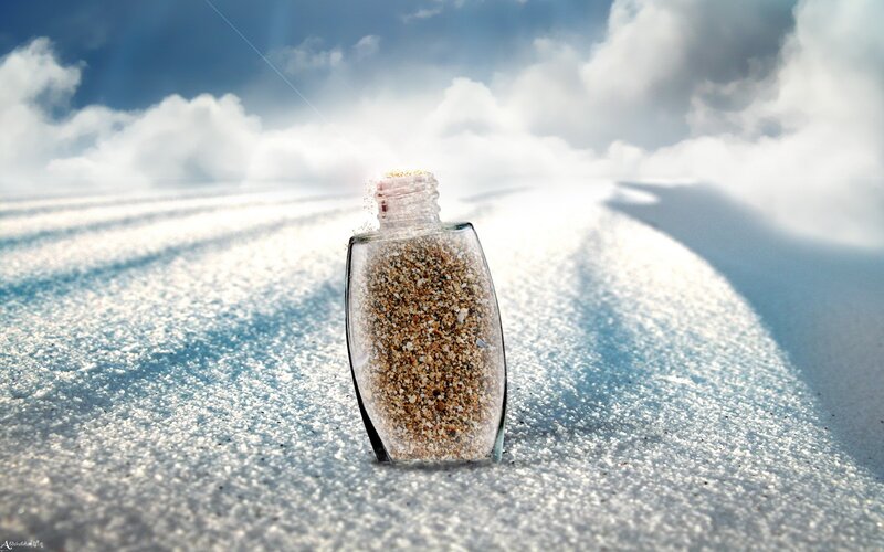 Sand bottle on beach