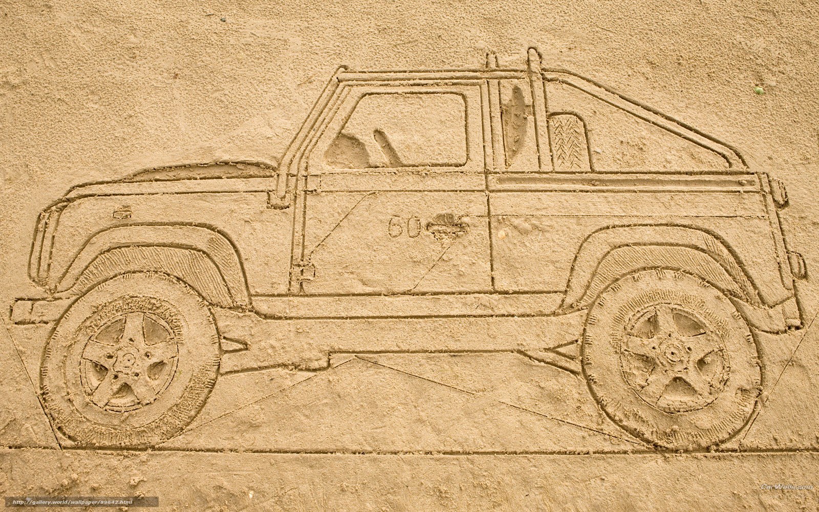 Sand carving of a pickup truck