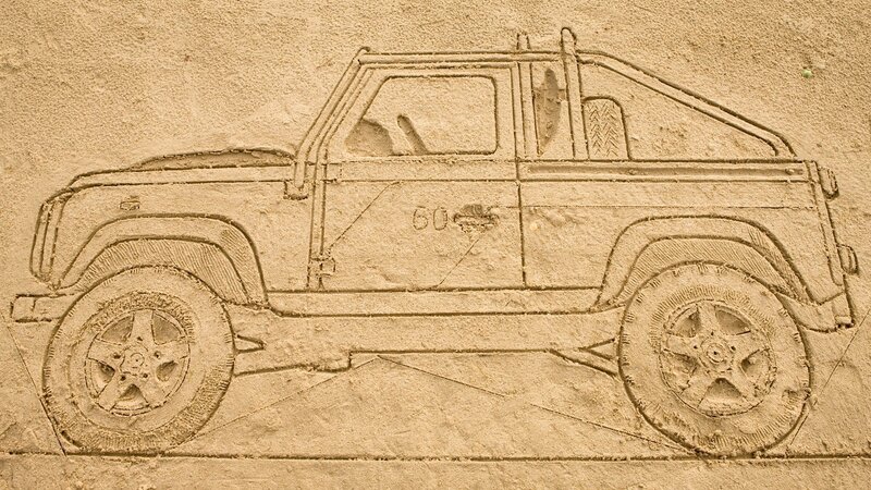 sand carving of a truck