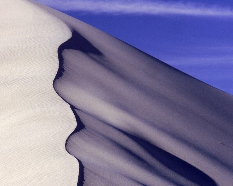 Sand dune with blue sky