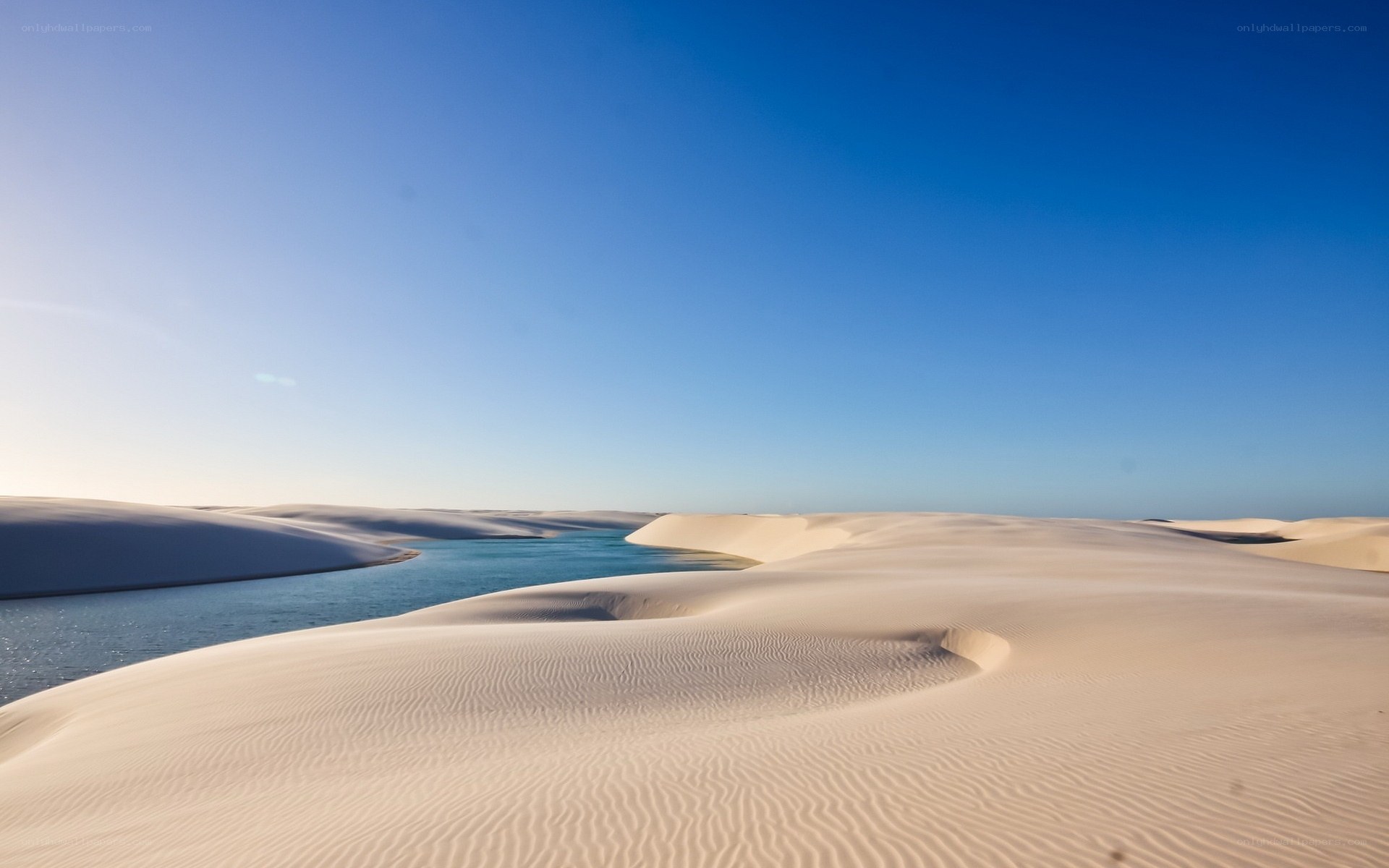 Sand dunes and blue lagoon