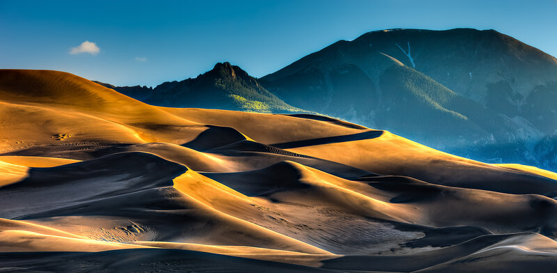 Sand Dunes and Mountains — Orange, Serene