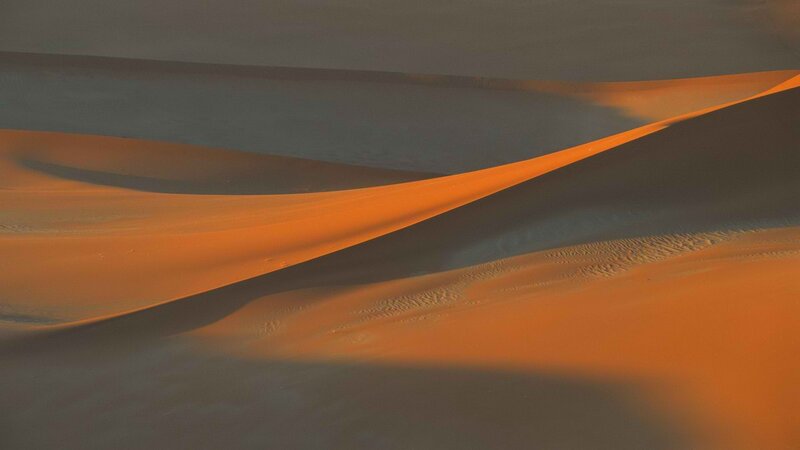 sand dunes at sunset