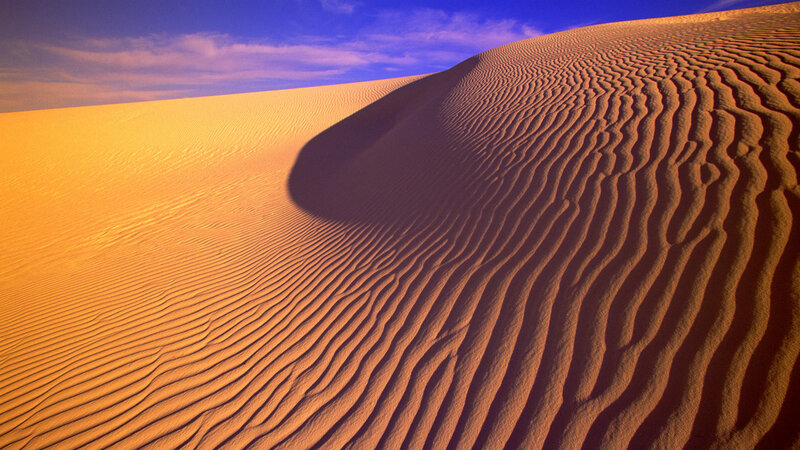 Sand dunes at sunset