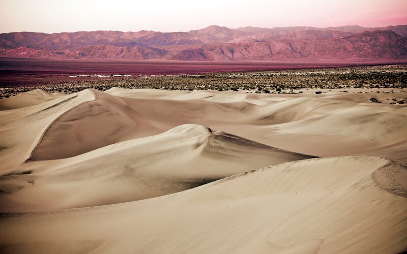 Sand Dunes in Desert — Beige, Serene, Sunset, Photograph, Mountains, Vegetation, Pink