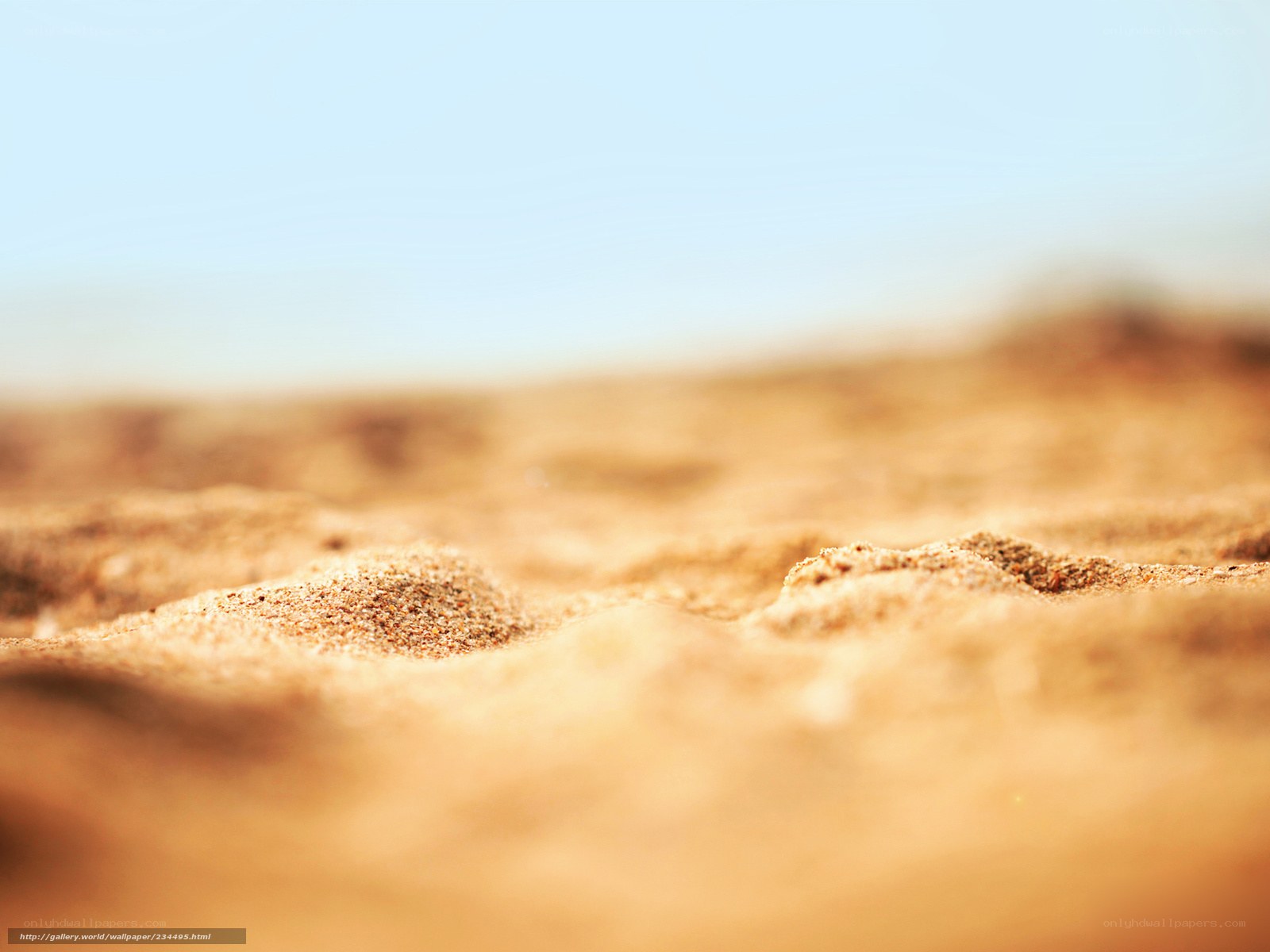 sand dunes under blue sky