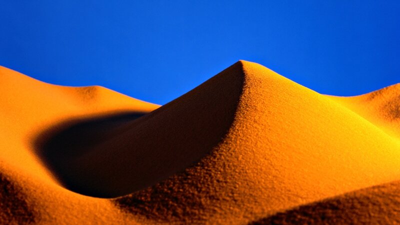Sand Dunes under Blue Sky — Dramatic
