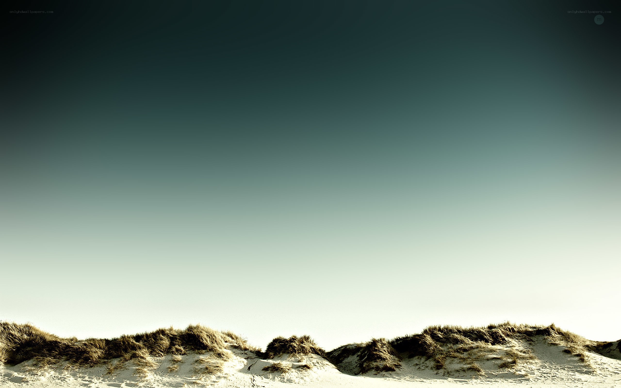 sand dunes under clear sky