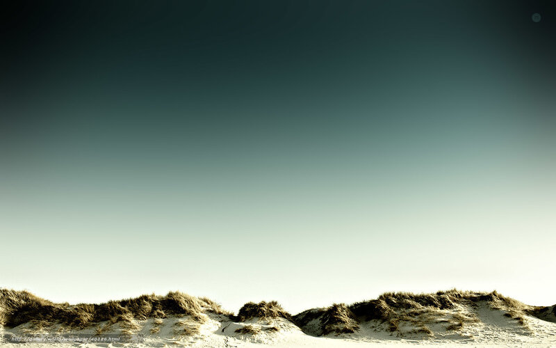 sand dunes under clear sky