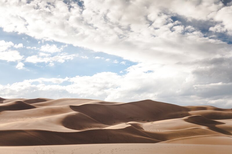 Sand Dunes under Cloudy Sky — Beige