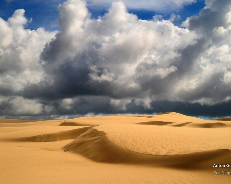 Sand Dunes under Cloudy Sky — Yellow