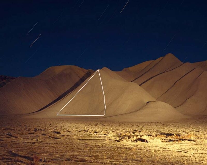 sand dunes with star trails