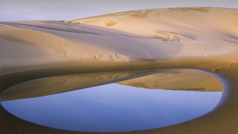 Sand Dunes with Water Pool
