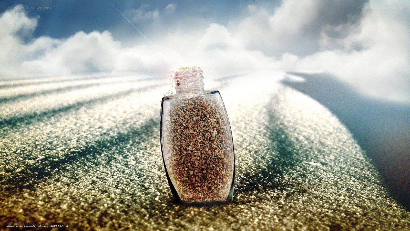 Sand in a bottle on beach