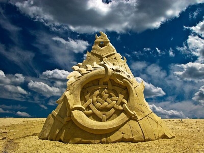 sand sculpture of a dragon