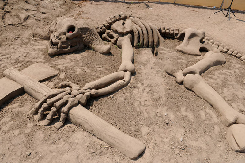 sand sculpture of skeleton