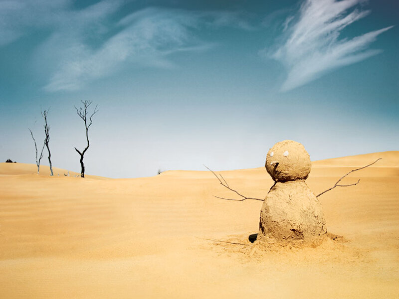 Sand snowman in desert