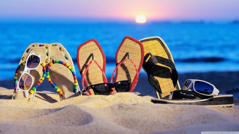 Sandals and Sunglasses on Beach — Blue