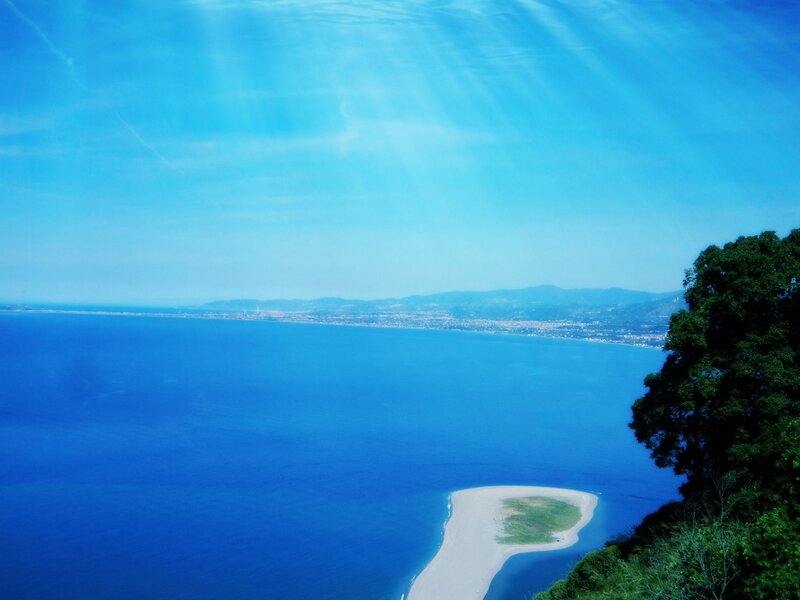 Sandbar in Blue Sea