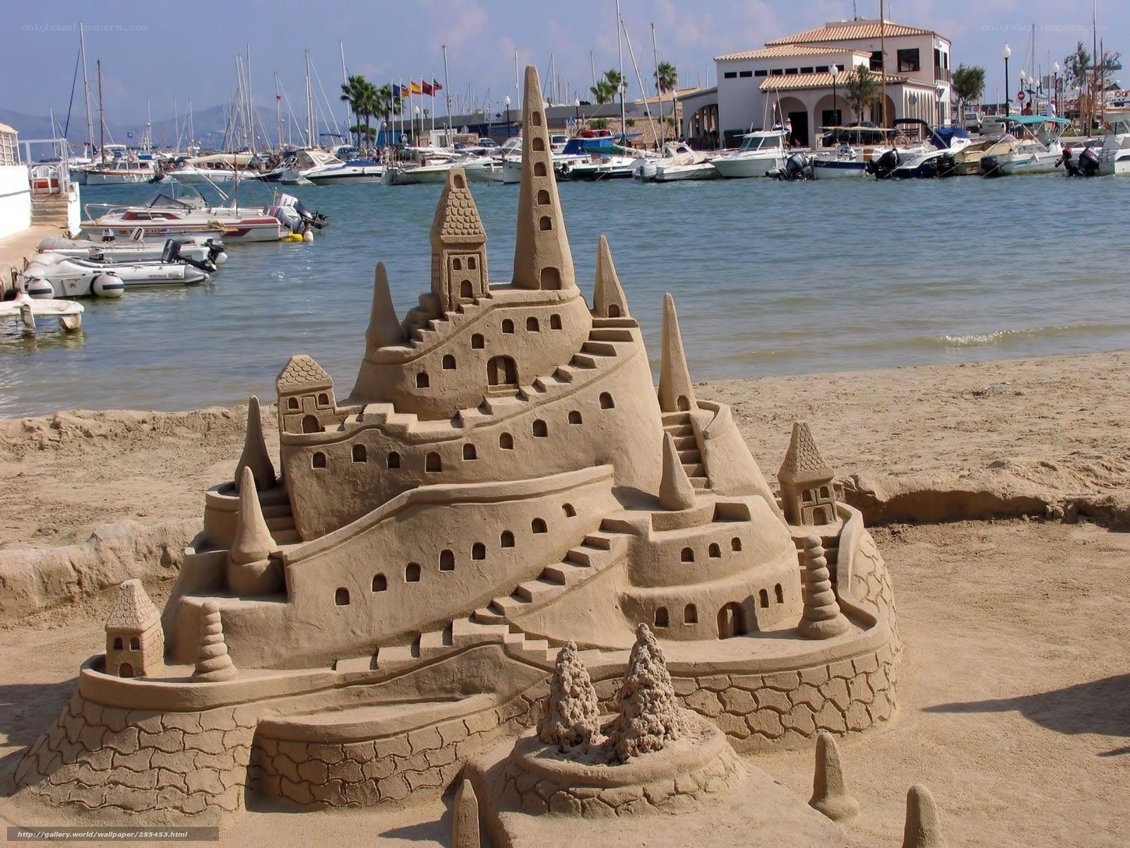 Sandcastle by the harbor