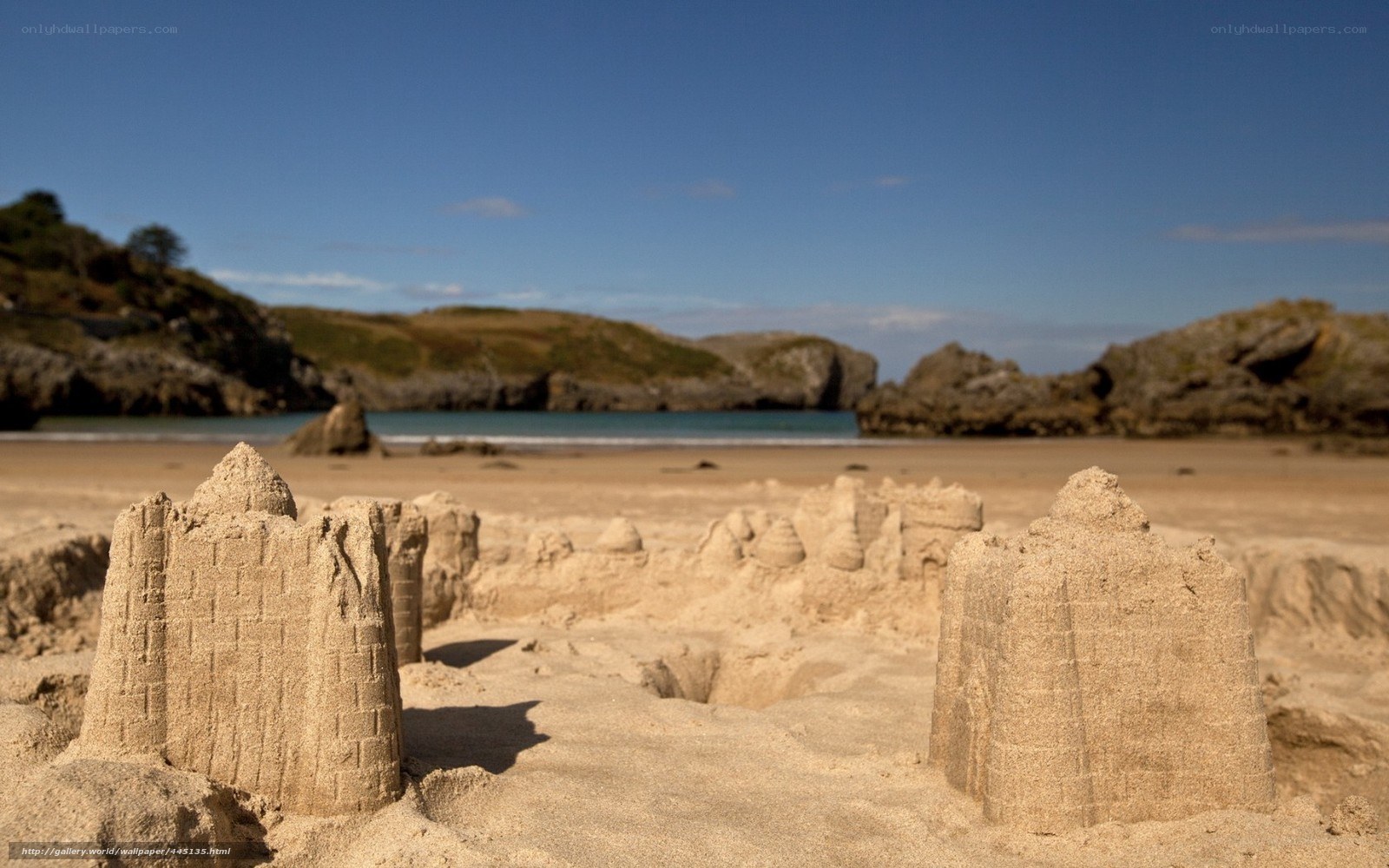 Sandcastle on a sunny beach