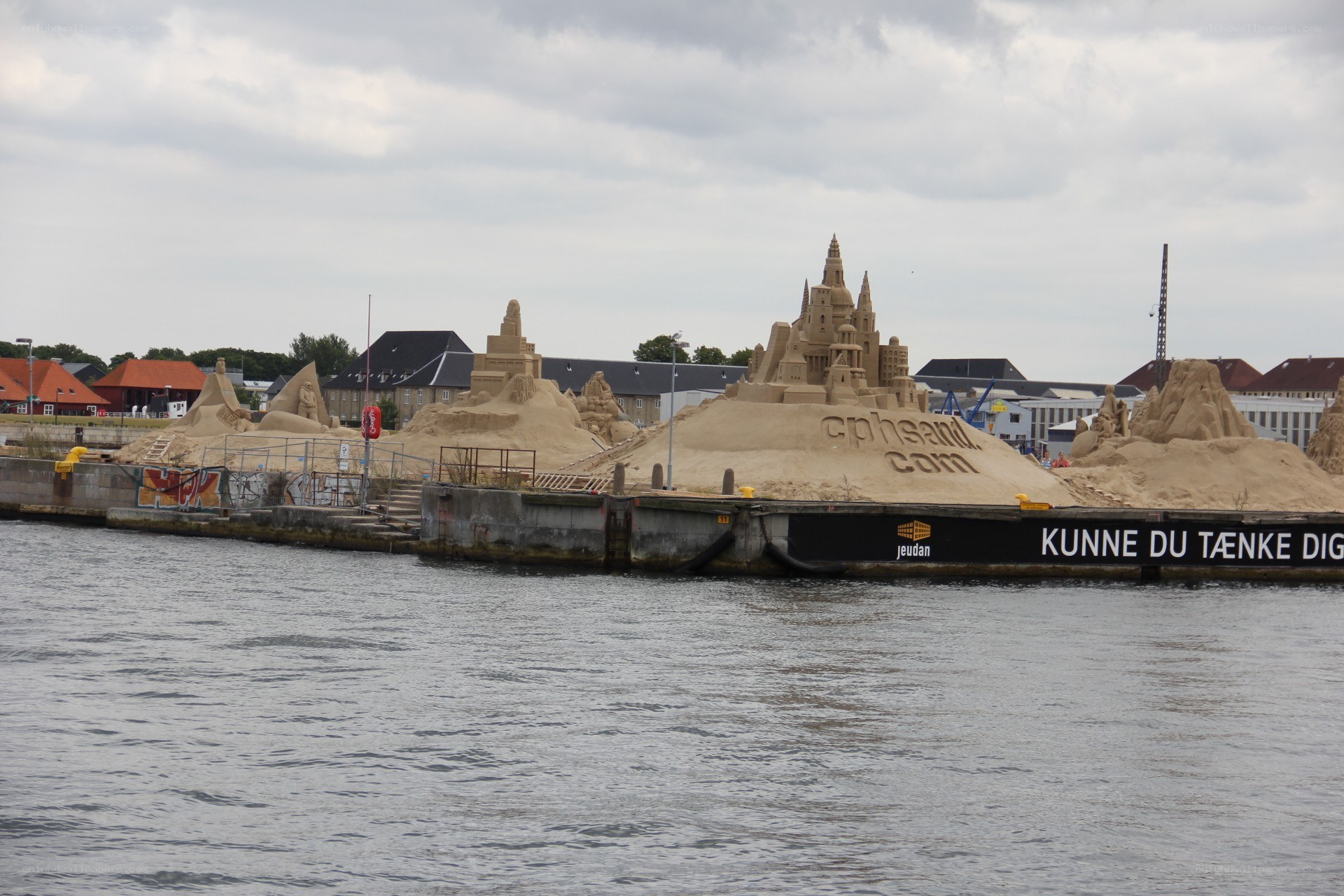Sandcastles at a harbor