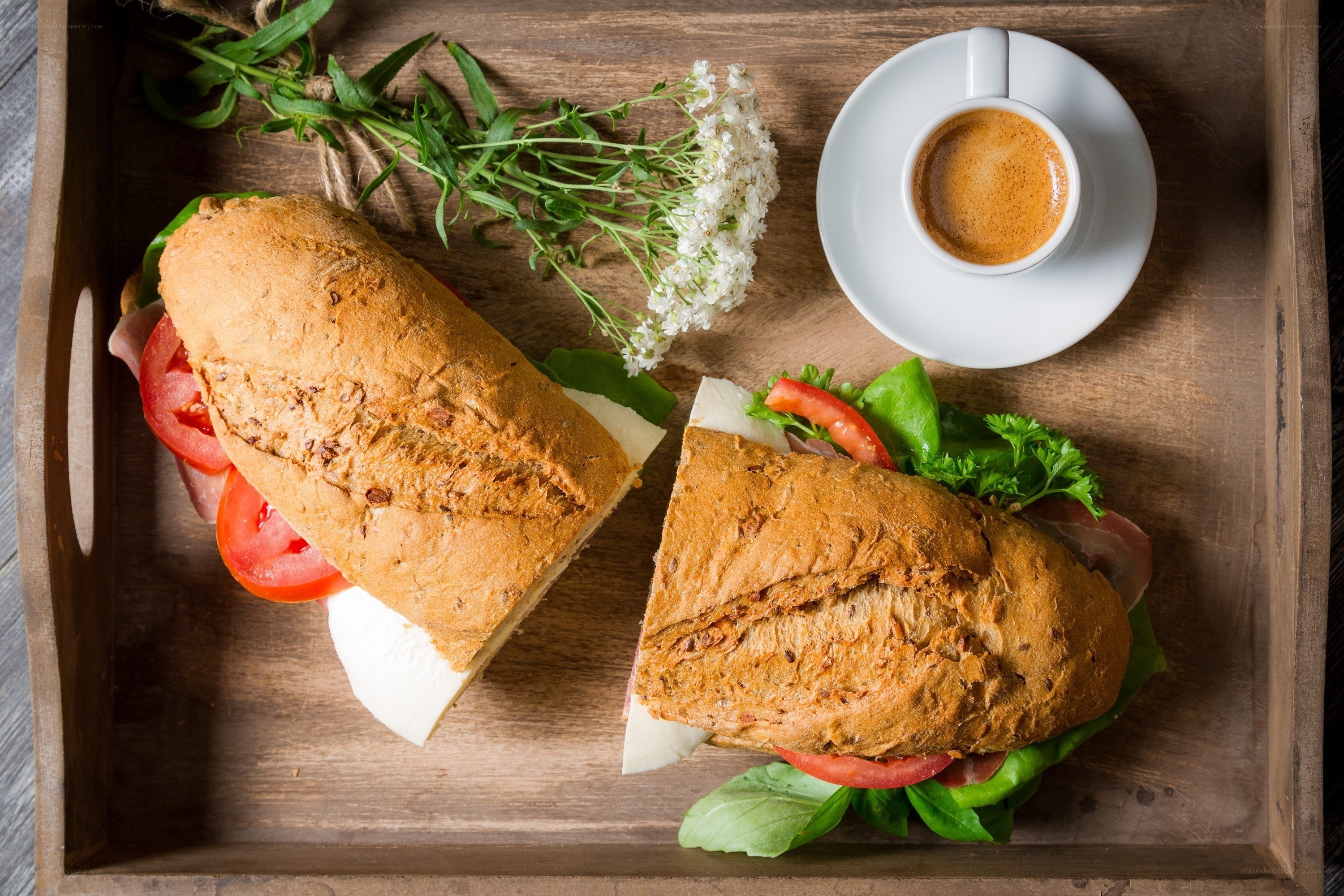 Sandwich and coffee on tray