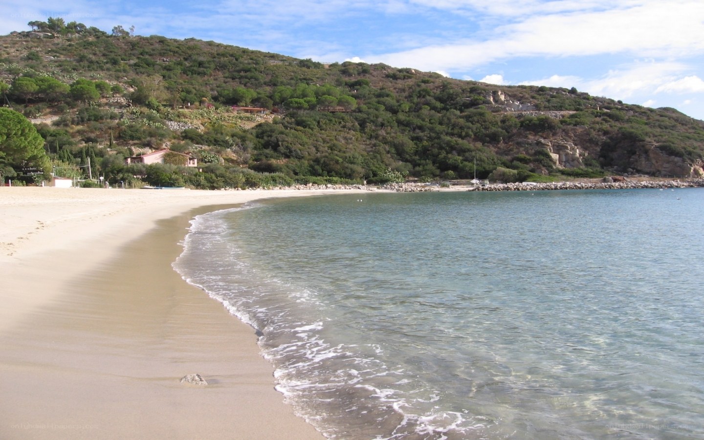 sandy beach with calm sea