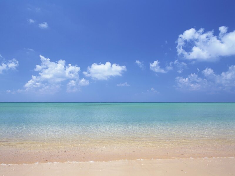 Sandy beach with clear turquoise water