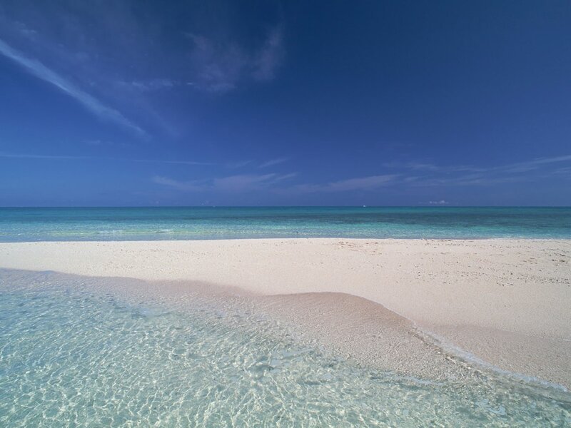 sandy beach with clear water