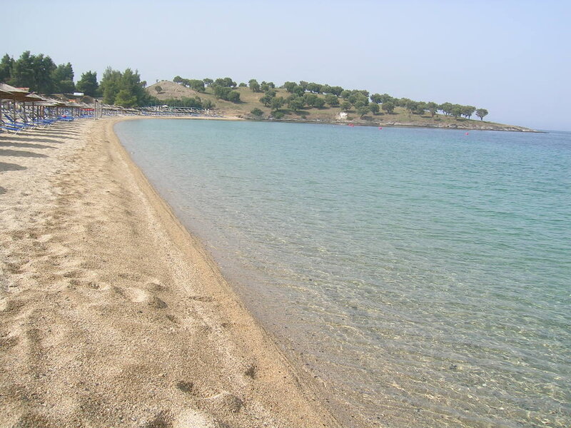 Sandy Beach with Clear Water — Beige