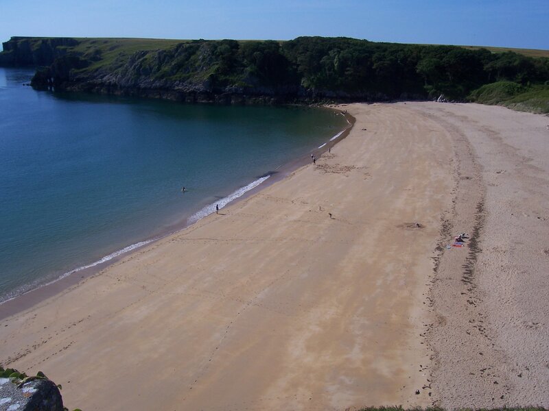 sandy beach with cliffs