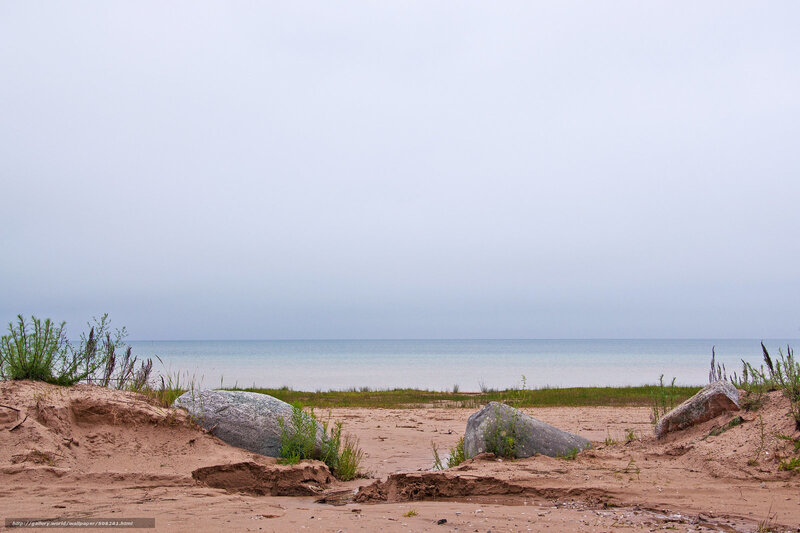 Sandy beach with large rocks