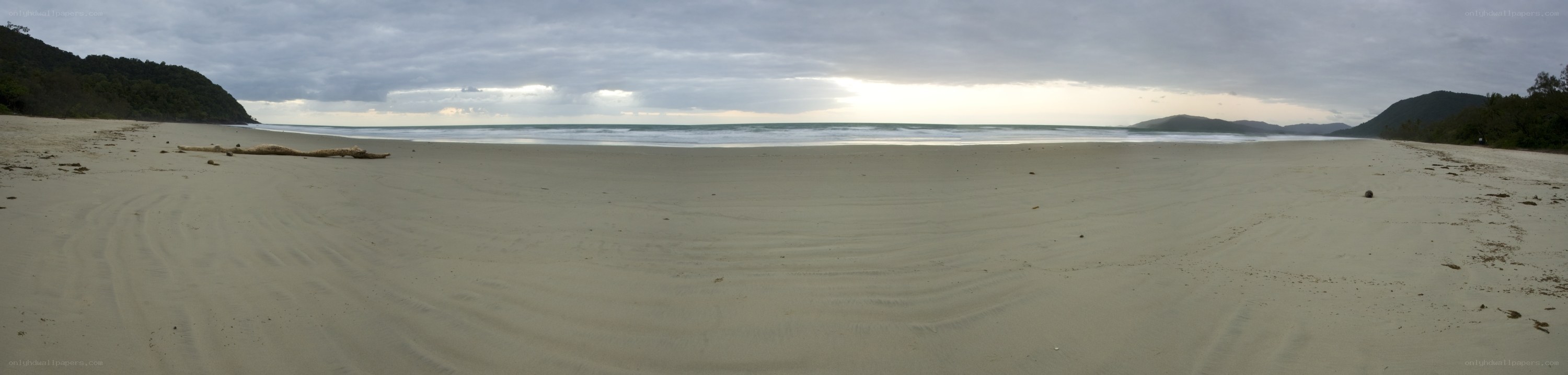 sandy beach with ocean view