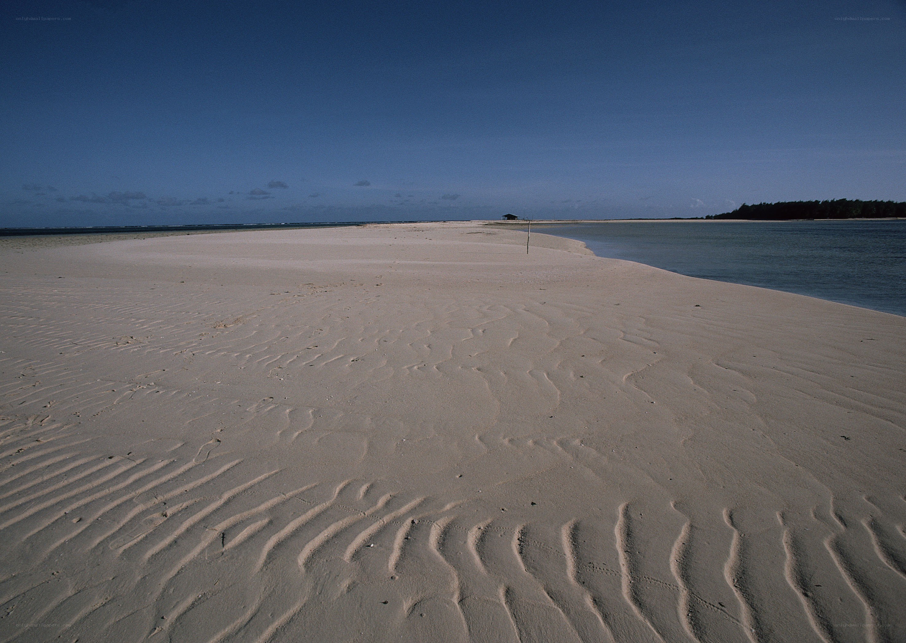 sandy beach with rippled patterns