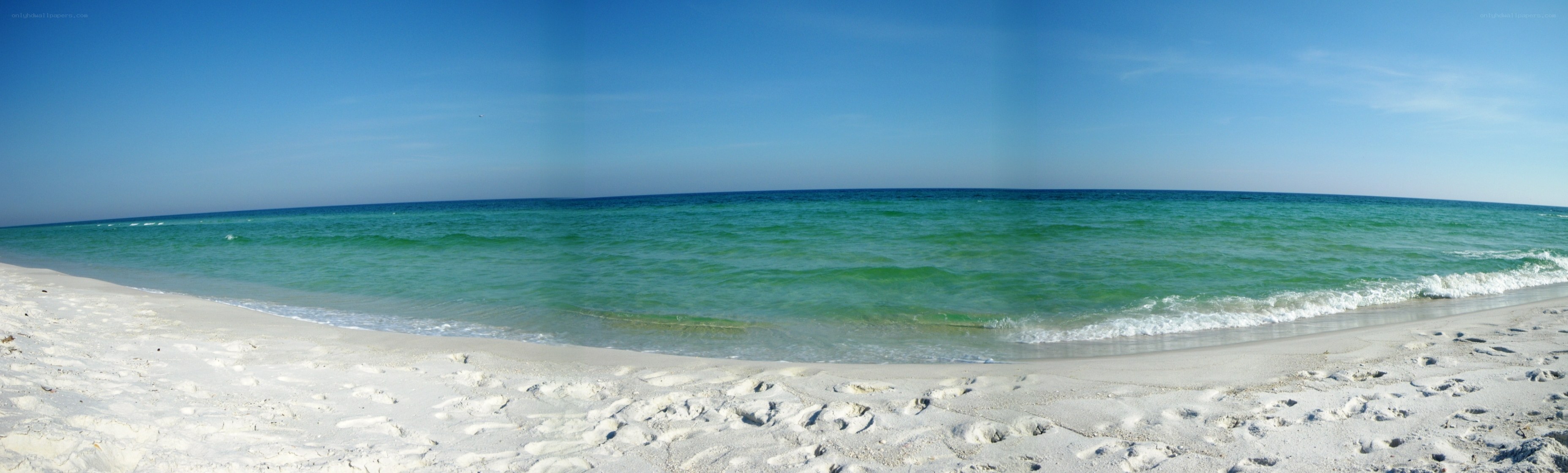sandy beach with turquoise water