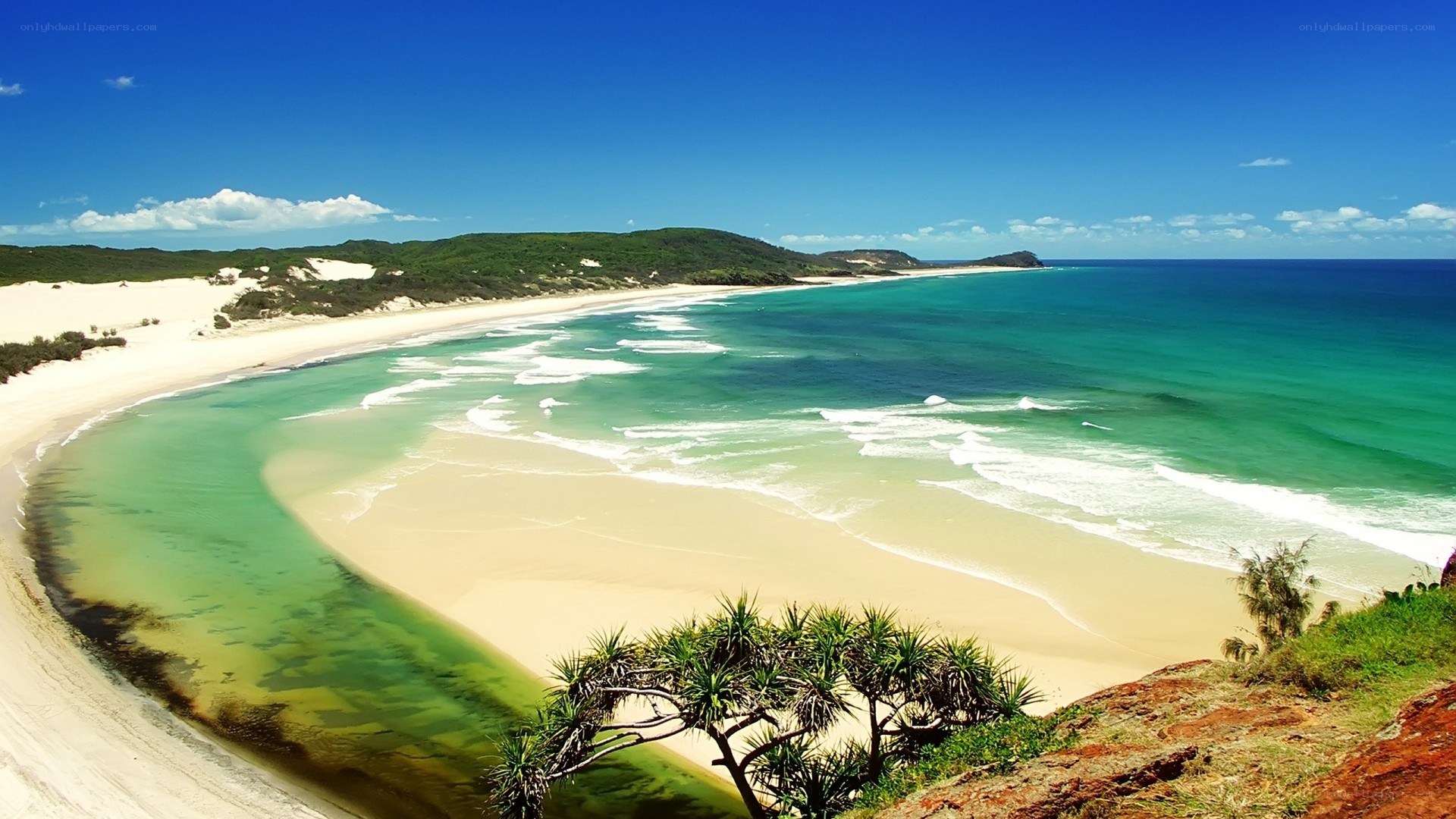 sandy beach with turquoise water