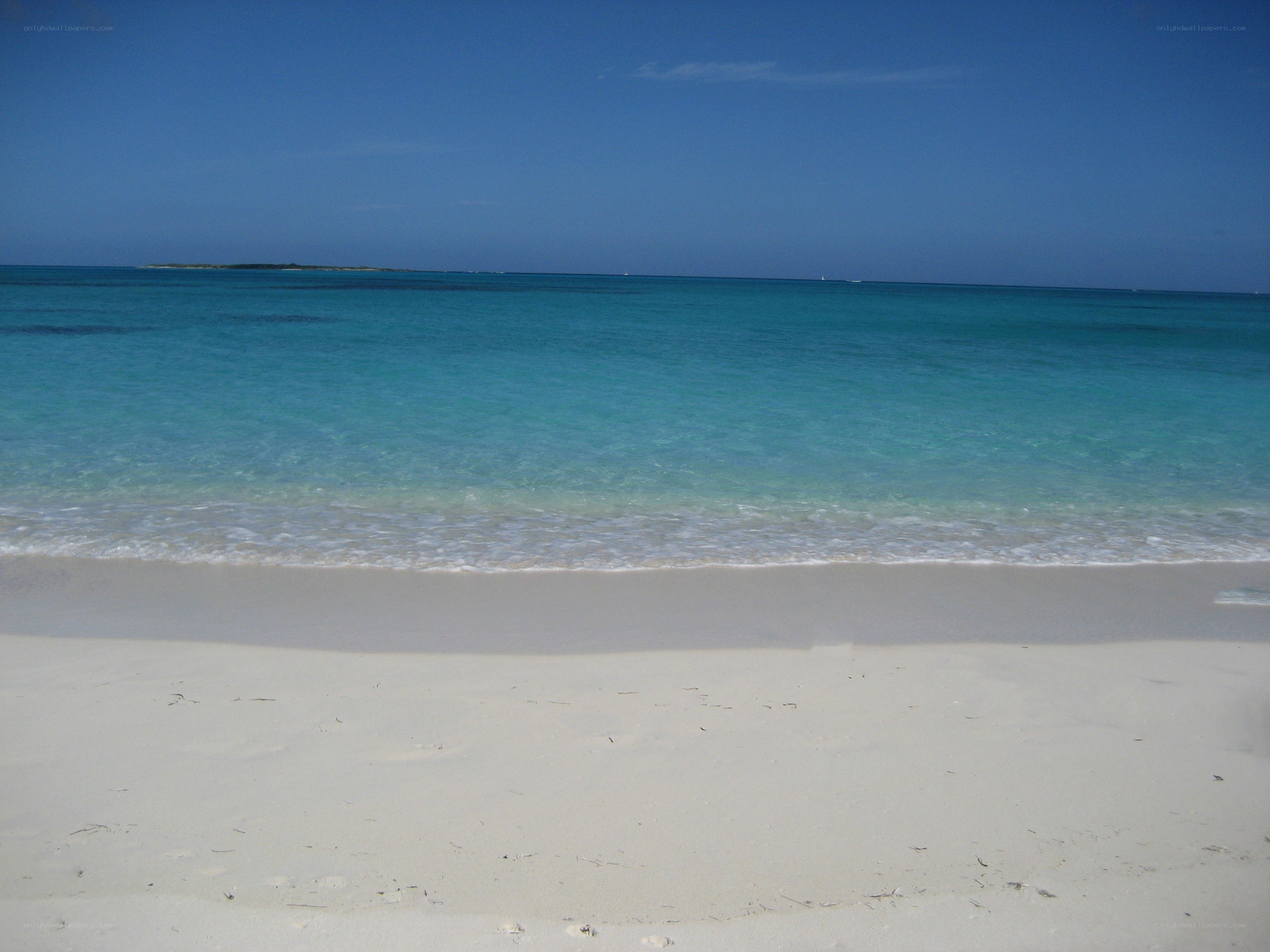 sandy beach with turquoise water
