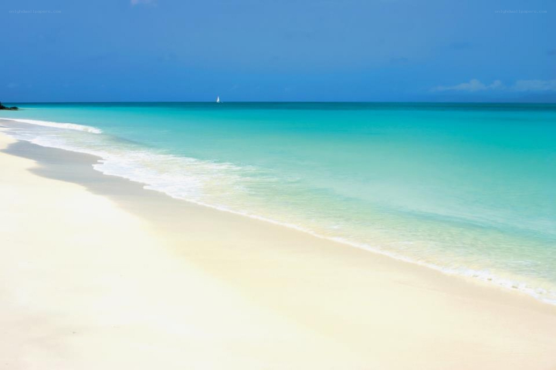 sandy beach with turquoise water