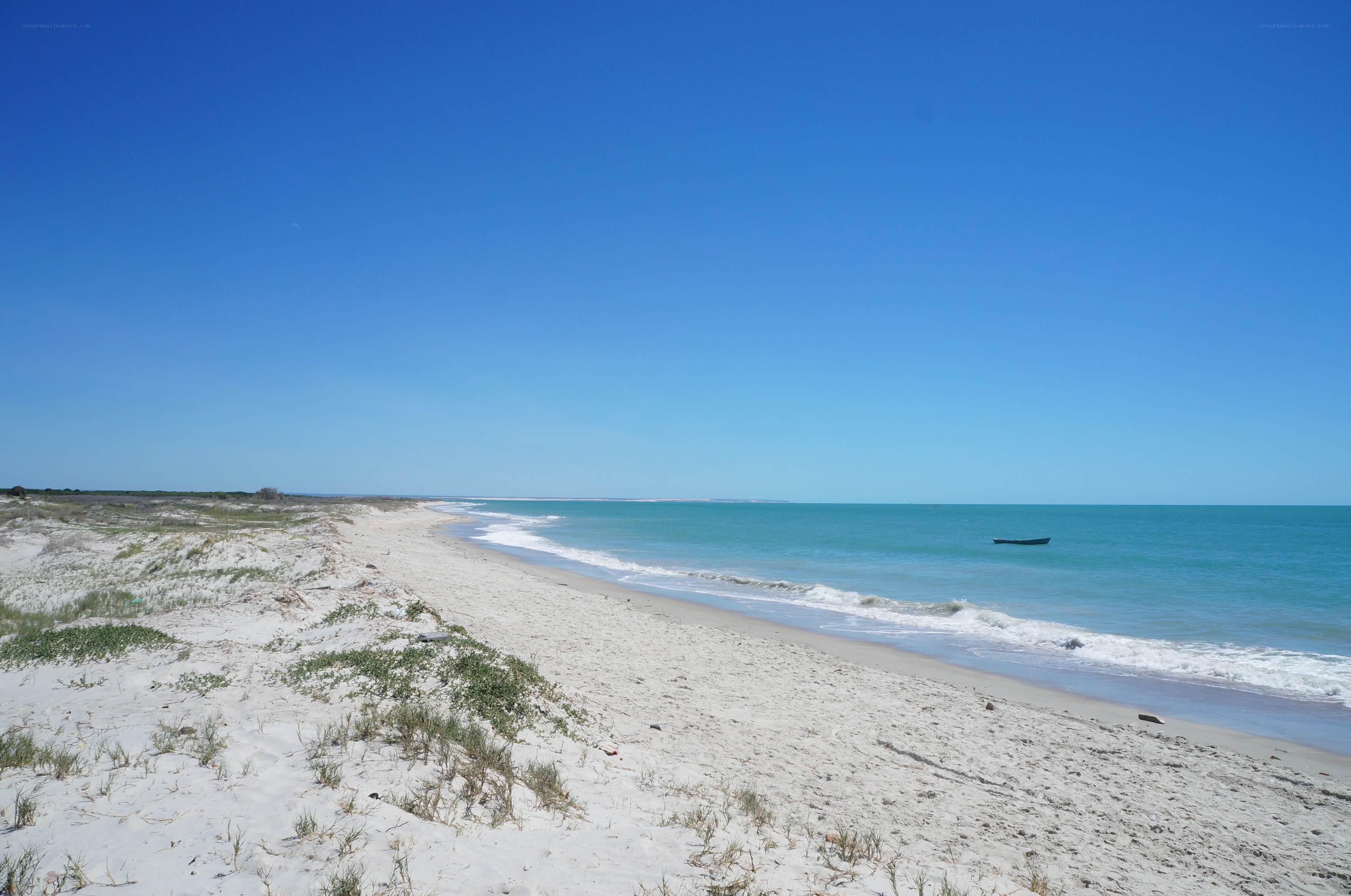 sandy beach with turquoise water