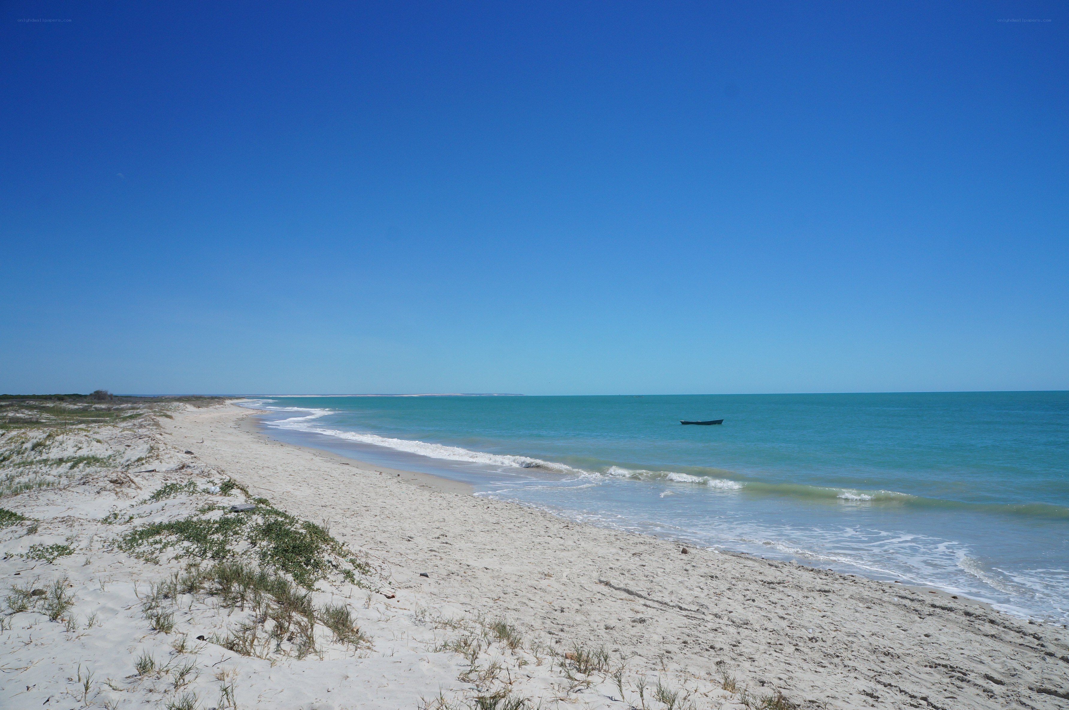 sandy beach with turquoise water