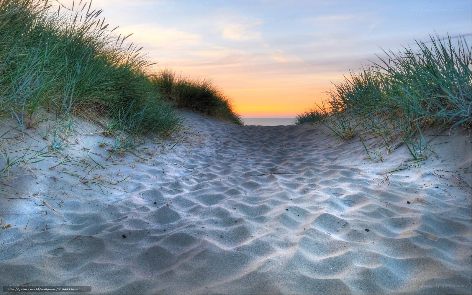 sandy path to sunset beach