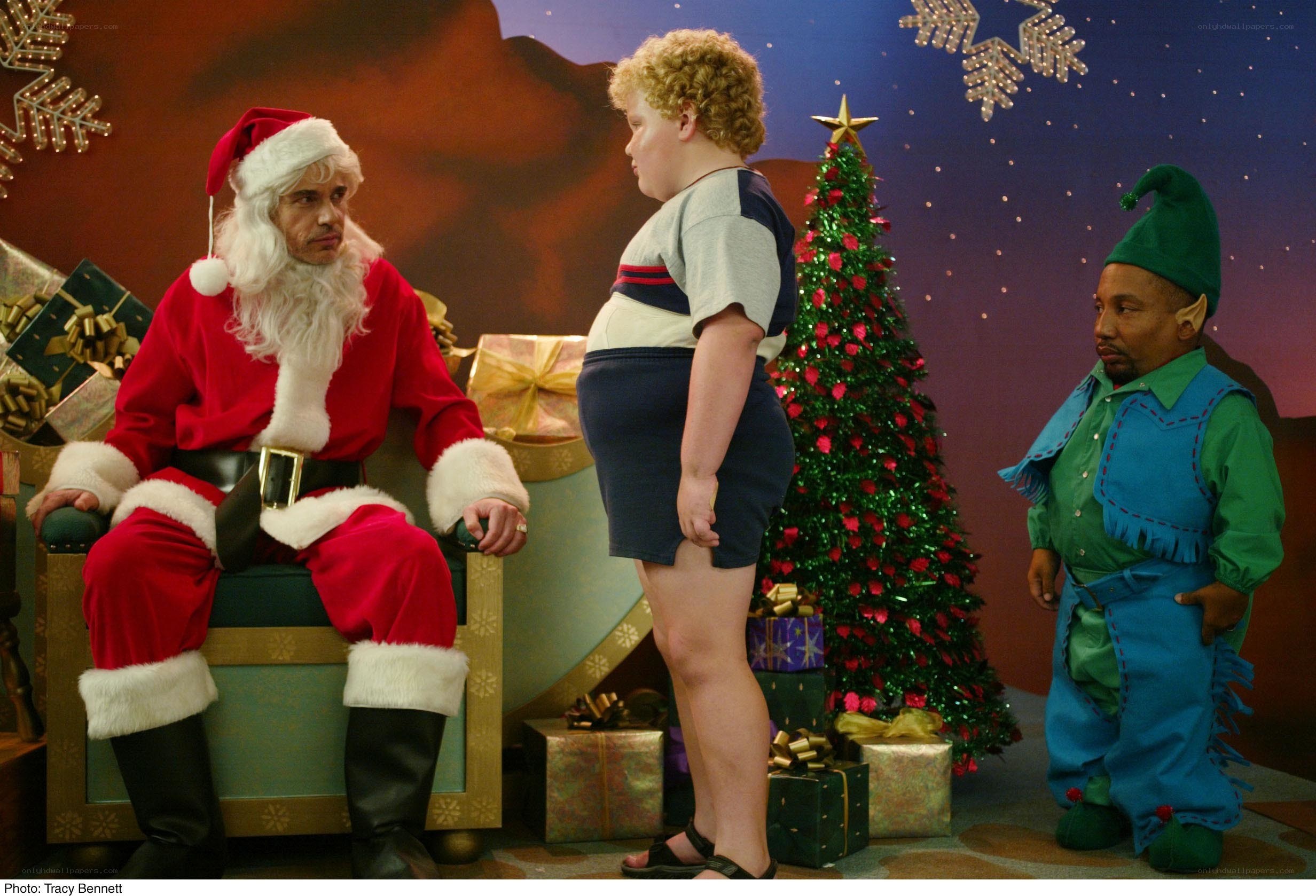 Santa and elf with boy