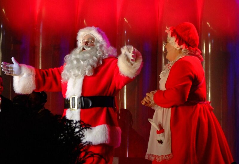 Santa and Mrs. Claus on stage
