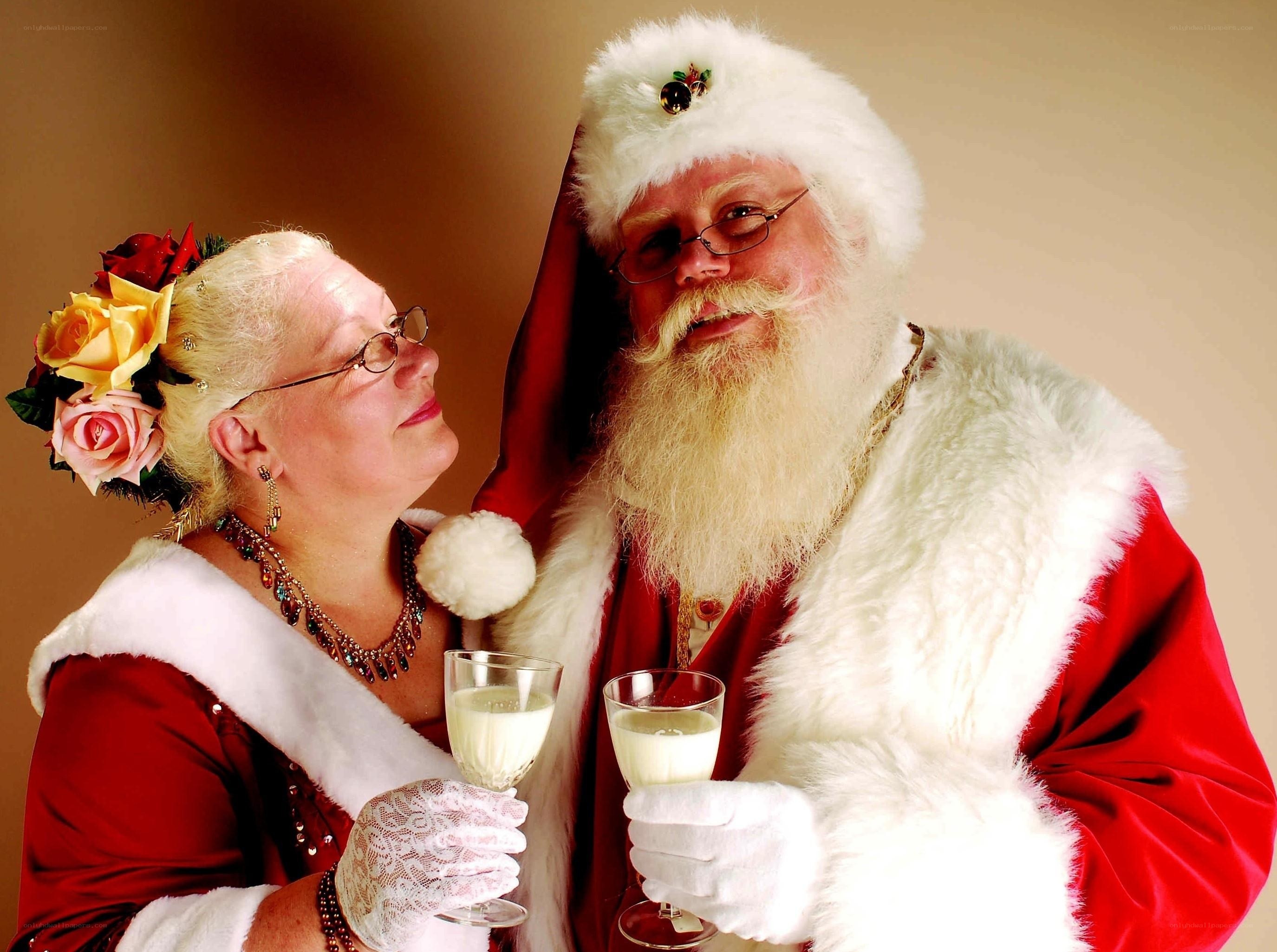 Santa and Mrs. Claus with drinks