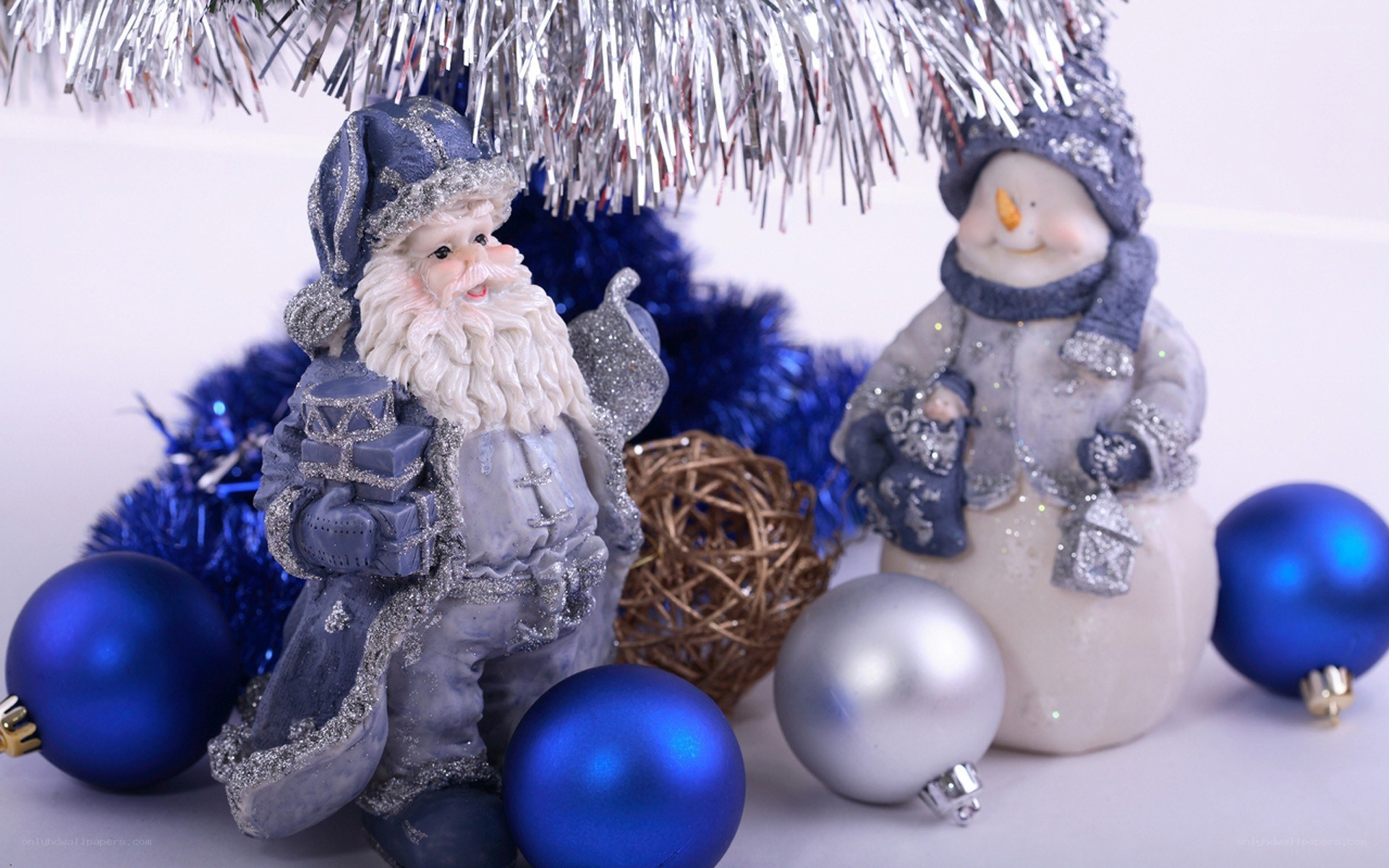 Santa and snowman figurines