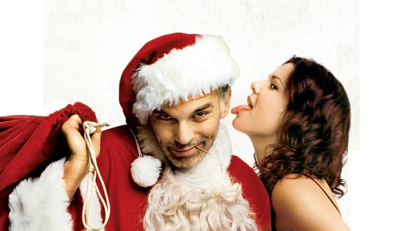 Santa and woman in festive scene