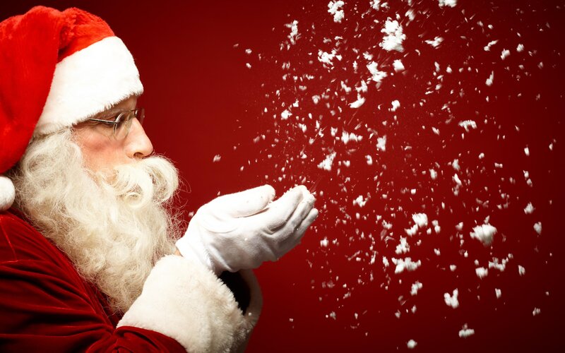Santa Claus Blowing Snow
