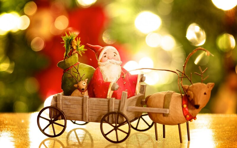 Santa Claus Figurine in Sleigh